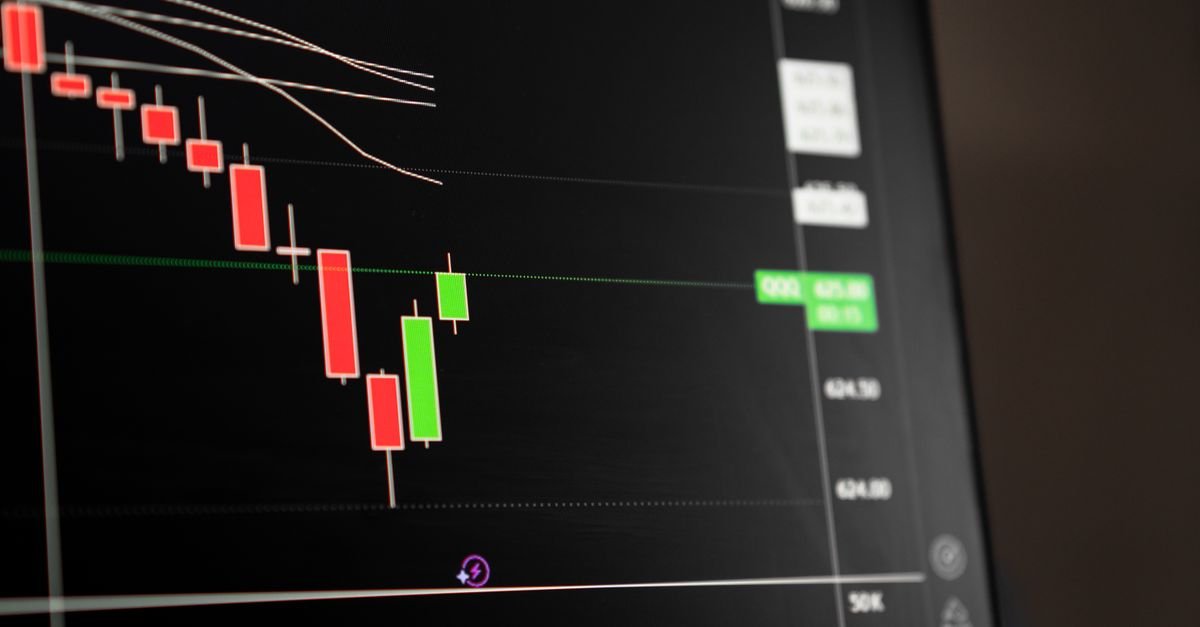 Candlestick chart showing a downward trend in the stock market analysis.